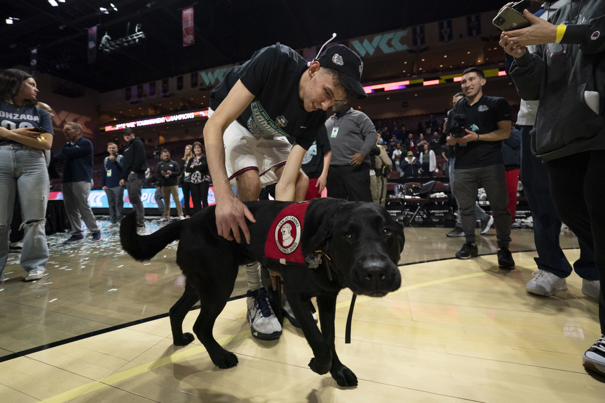The Holmgren family’s trusted Labrador, Slammer, has been a postgame feature after Gonzaga games this season.